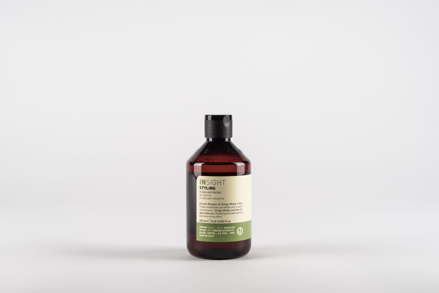 Fluide anti-frisottis